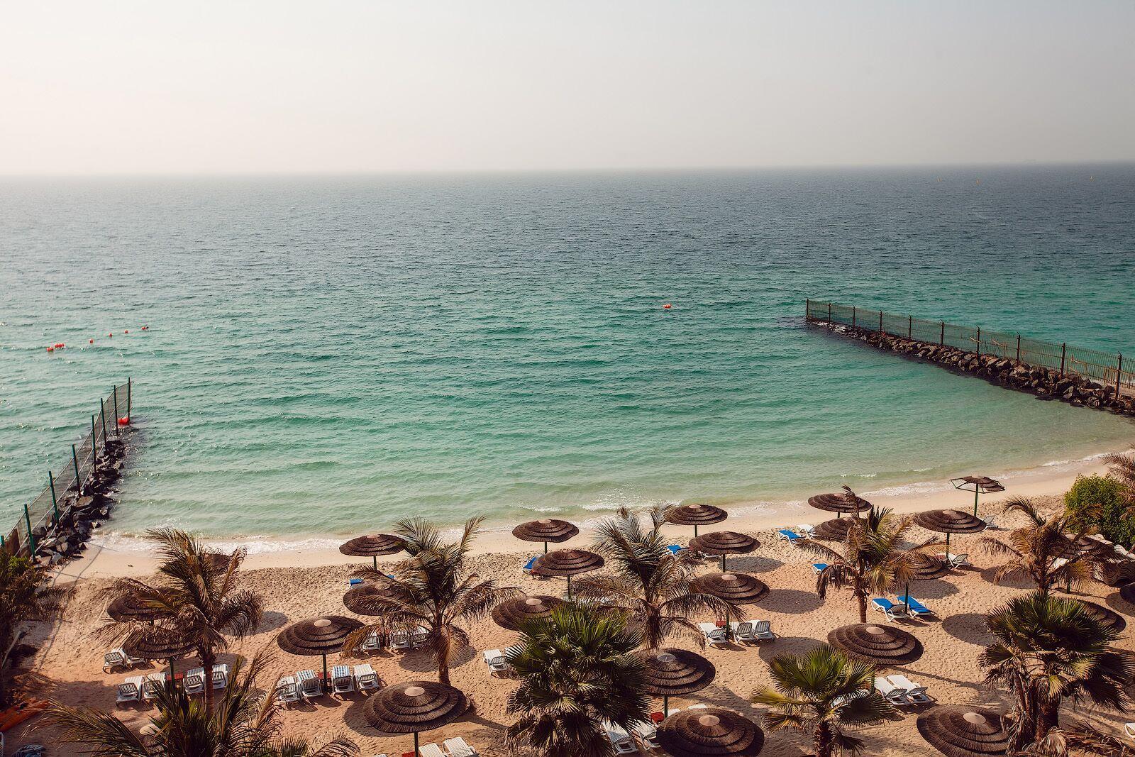 Sahara Beach Resort & Spa Sardzsa Kültér fotó The beach at the Kempinski Hotel, Muscat