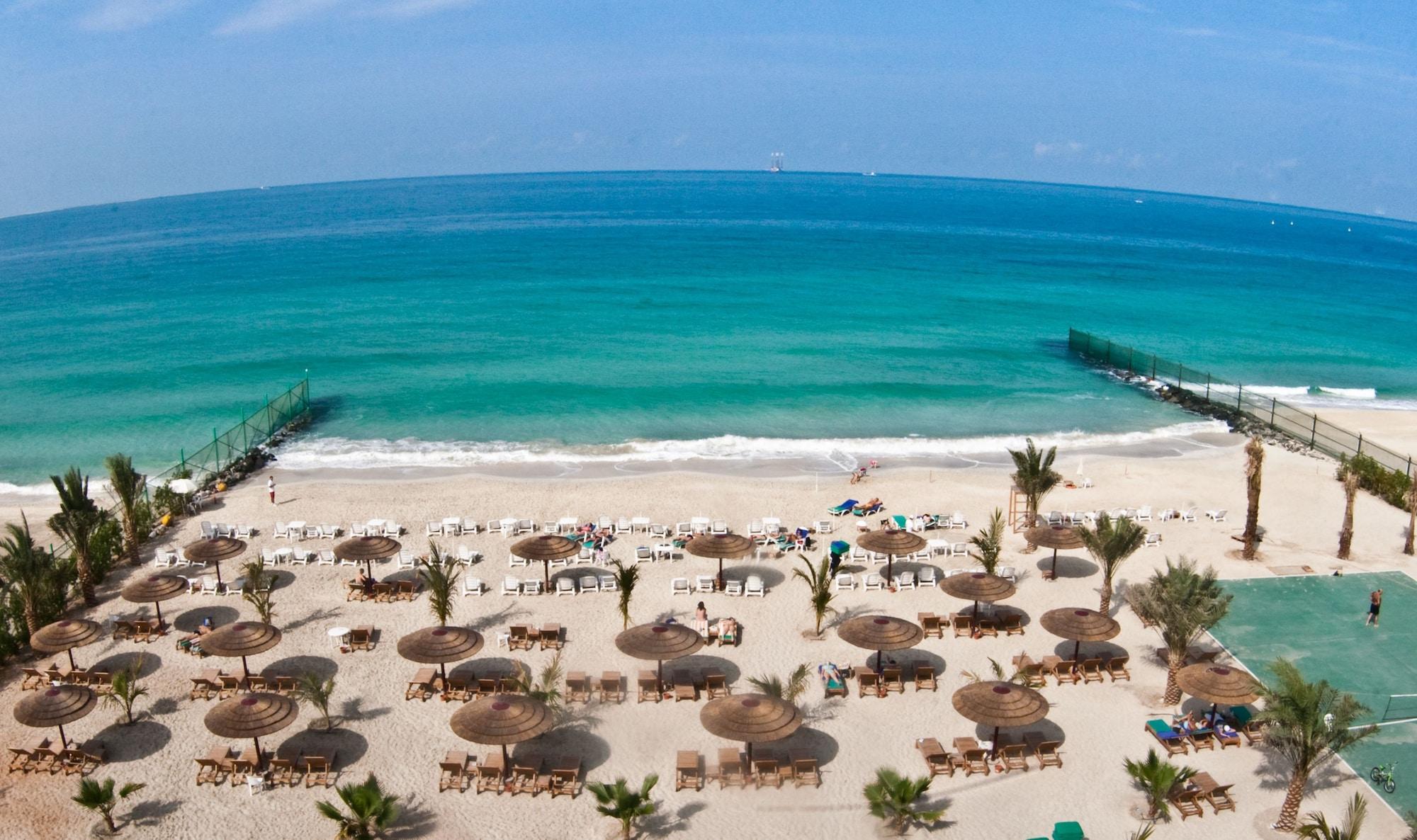 Sahara Beach Resort & Spa Sardzsa Kültér fotó Beach at Jumeirah Beach Hotel